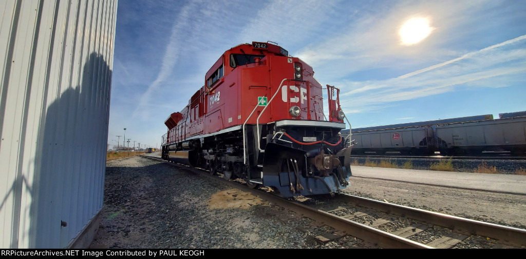 CP 7042 sits on a side Track at the KCS-CP Harvey Knoche Yard. 